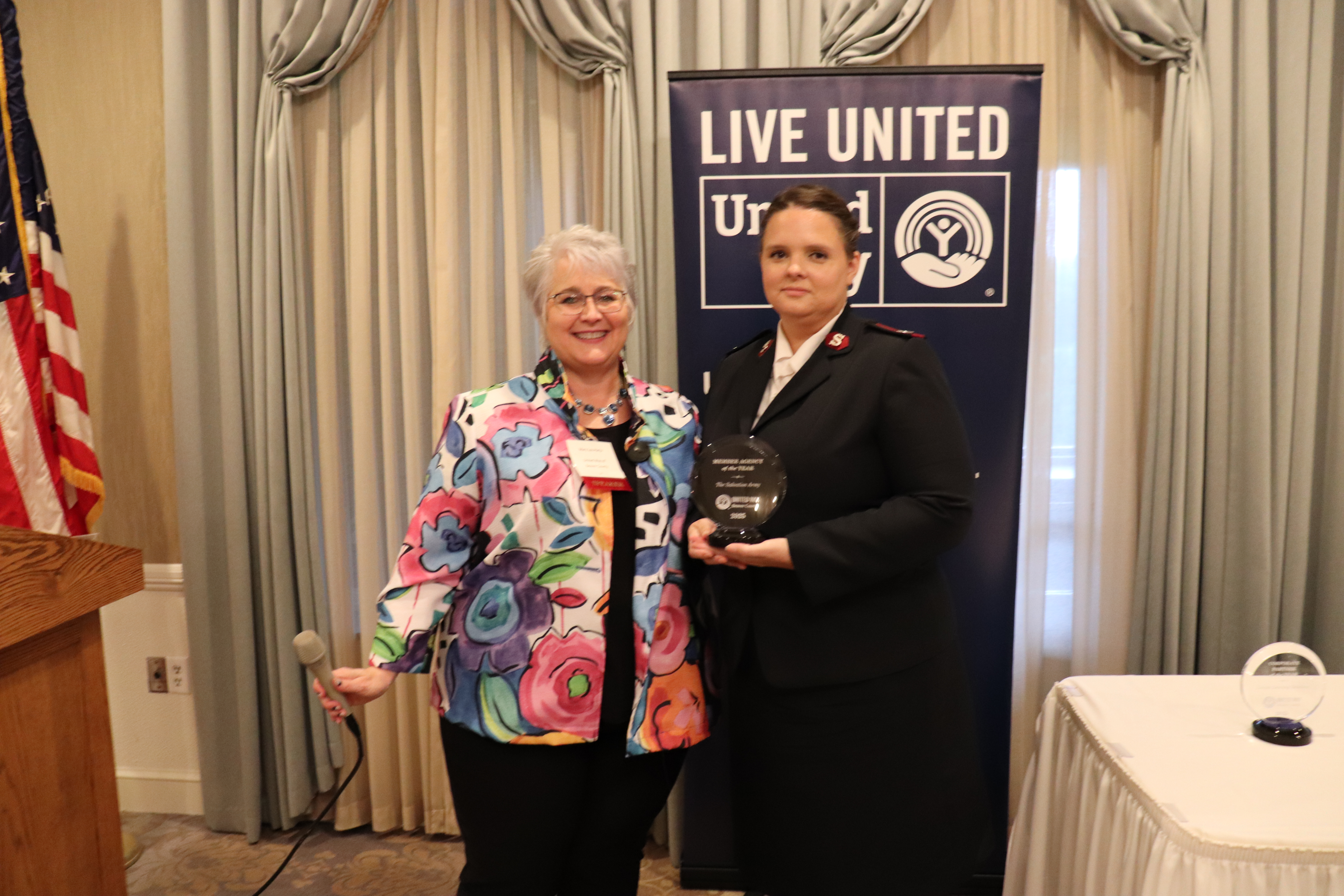 Major Dorothy Budd accepting the Member Agency of the Year for the Salvations Army
