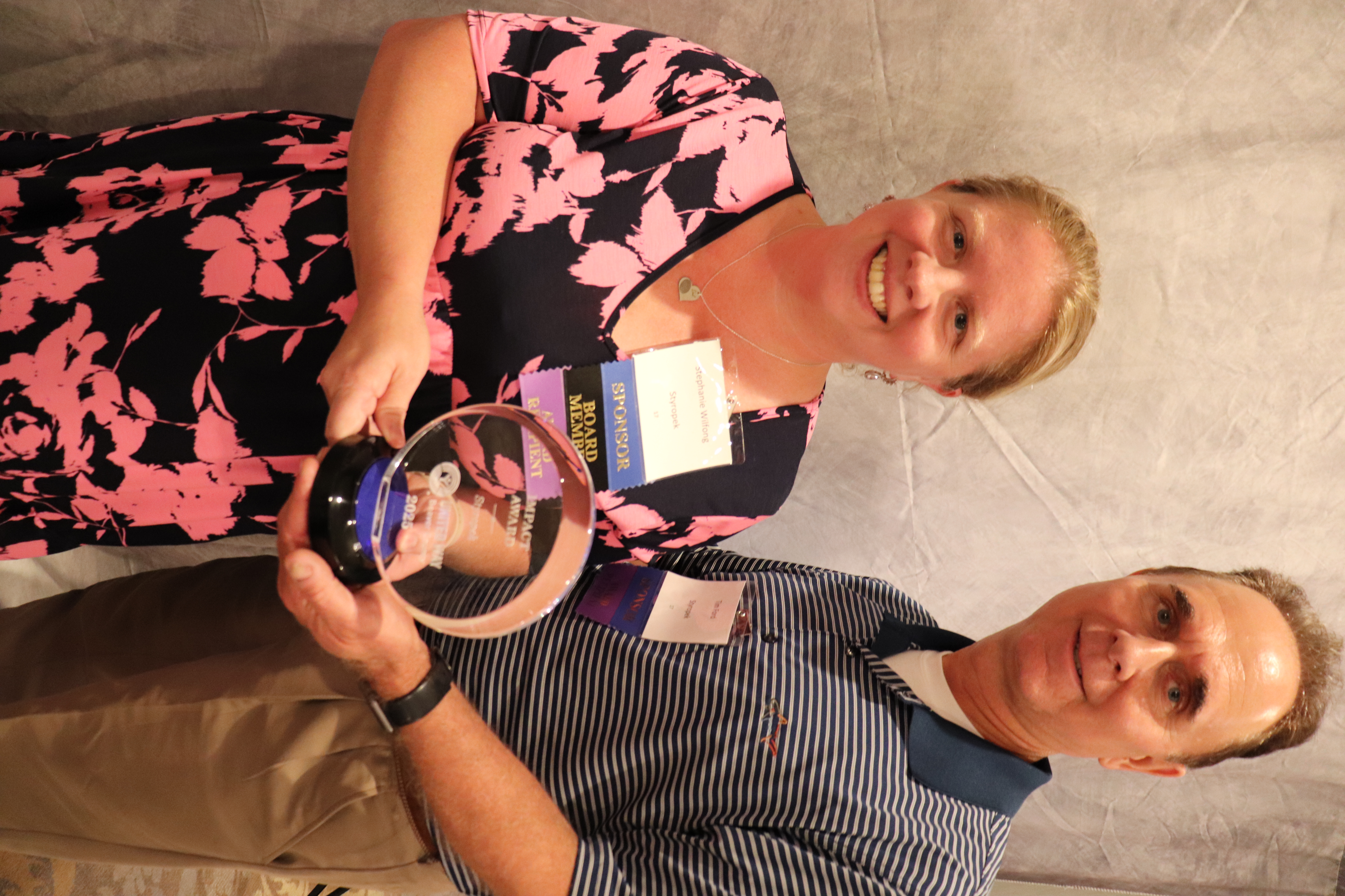 Time Ford and Stephanie Wilfong accepting the Impact Award for Styropek