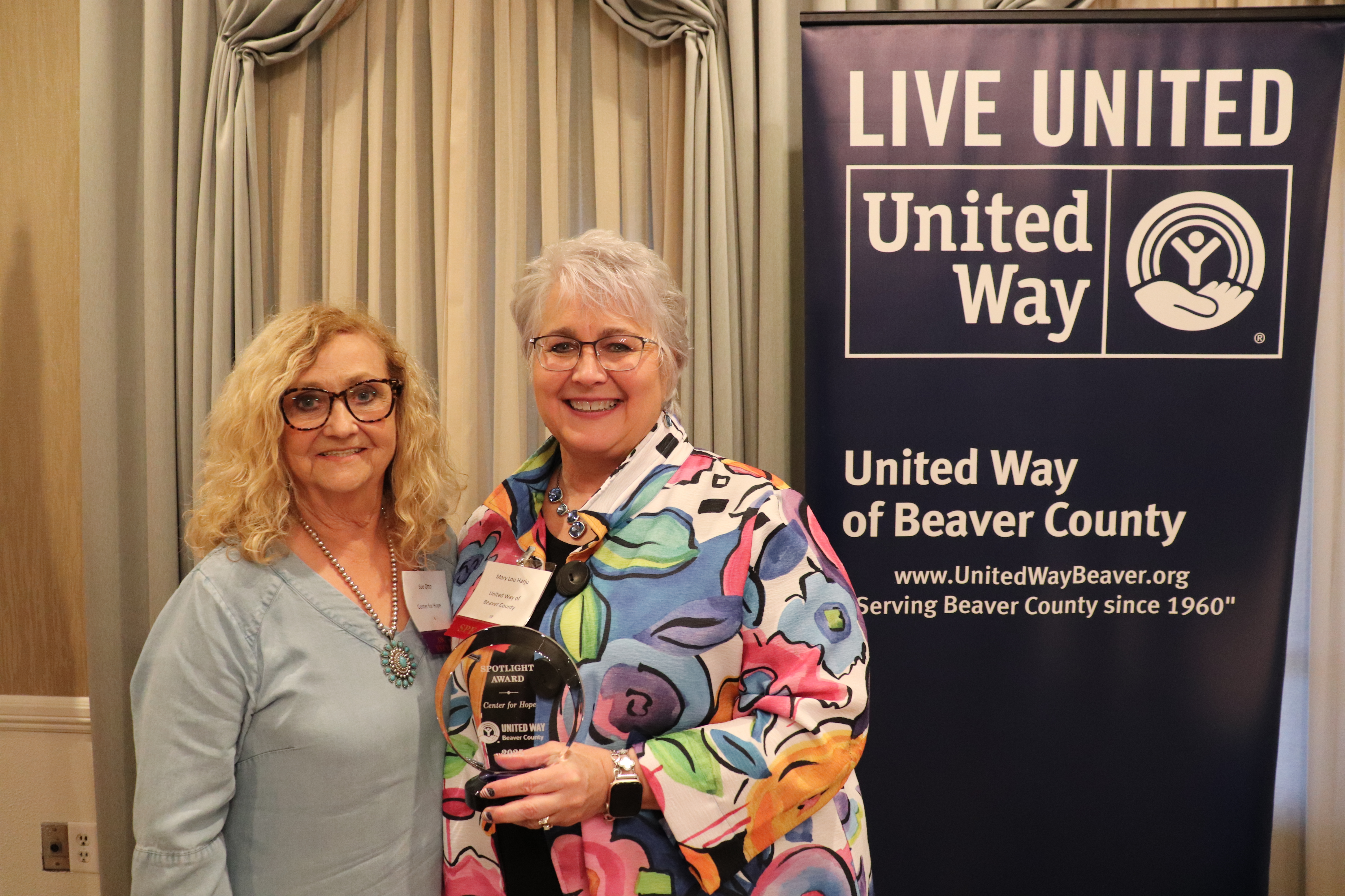 Spolight Award being accepted by Center for Hope