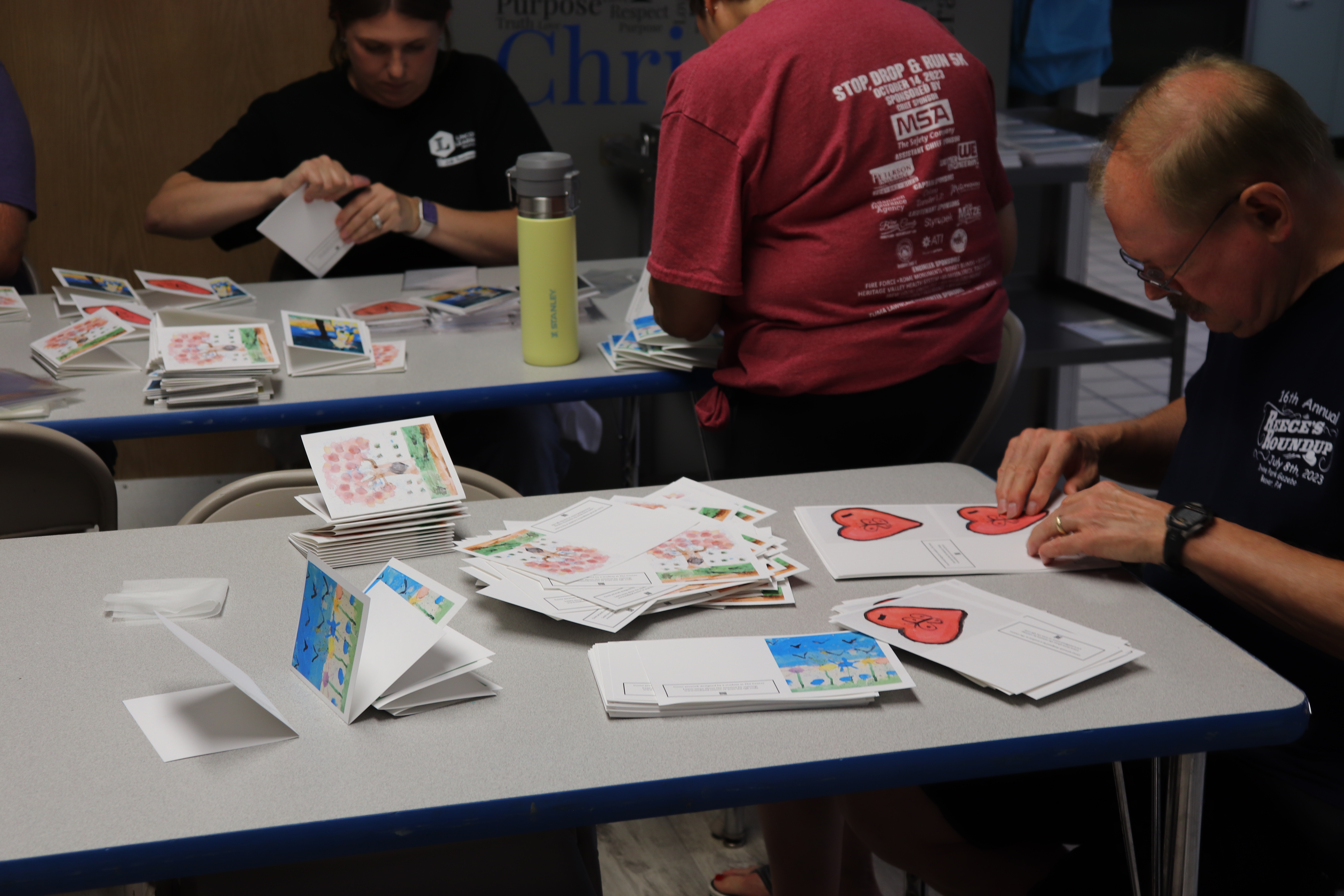 Volunteers prepping crafts